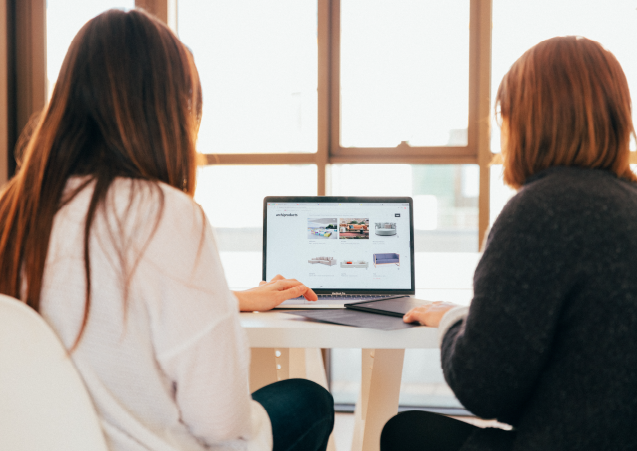 Women looking at laptop